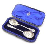 A pair of Edward VII Art Nouveau silver fruit spoons, Josiah Williams and Company, London 1903, 2.86
