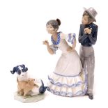 A Nao porcelain figure of young Flamenco dancers, 27.5cm high, together with a Nao figure group of a