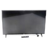 An LG 43" flat screen television, 43UJ6230V, with remote.