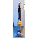 A Dyson DC40 upright vacuum cleaner.