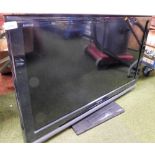 A Sony Bravia 42" television, with lead and remote.