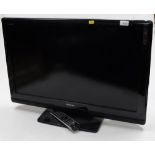A Toshiba Regza 32" television, V66A00241000, with lead and remote.