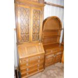 An Old Charm style oak bureau bookcase, 197cm high x 79cm wide x 47cm deep, and a matching dresser.