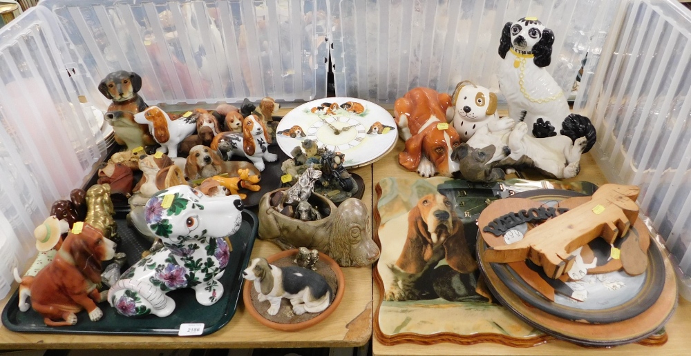 A group of novelty dog figures, mainly Basset Hounds, pottery, resin, novelty Basset Hound wall cloc