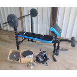 A Profitness bench press, with various weights.