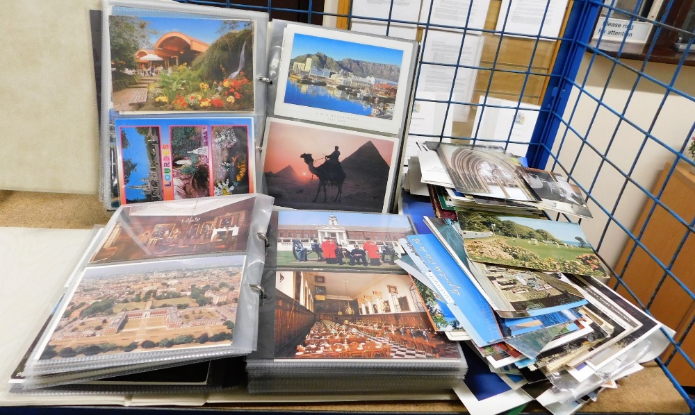 Various postcards, for Scotland, Rutland, Wensleydale, etc., in two albums and loose.