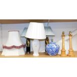 A group of table lamps, to include a pair of pottery lamp bases, with mottled drip glaze, in brown a