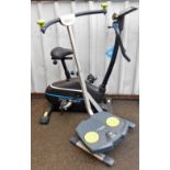 A Roger Black fitness exercise bike, and a Twist and Shape exercise machine.