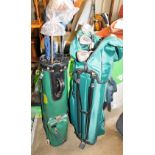 Two golf bags, containing assorted golf clubs.