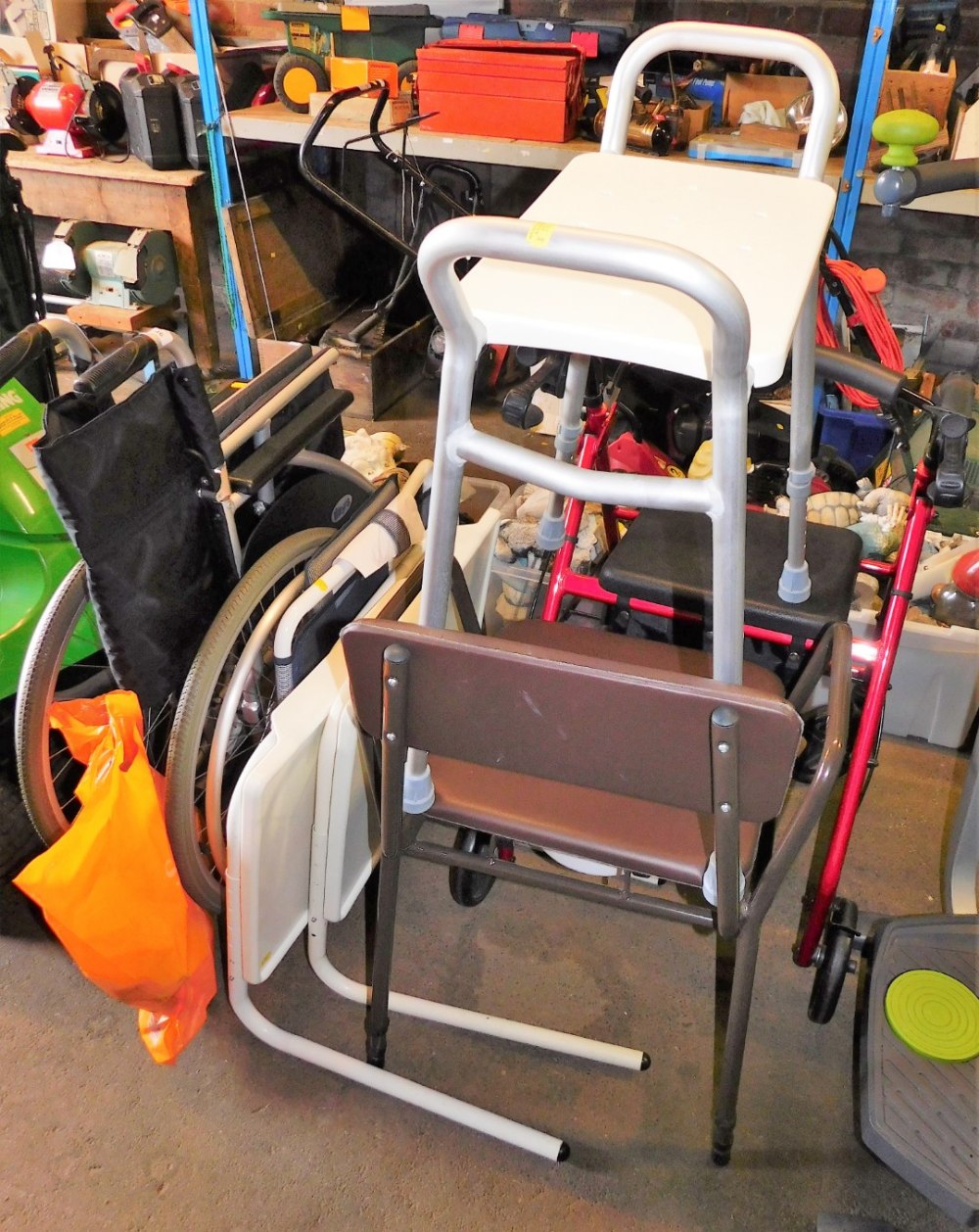 A group of mobility aids, to include a Days folding wheelchair, a mobility walker, etc.