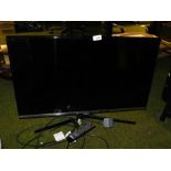 A Samsung 31" television, with lead and remote.