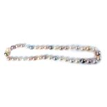 A single strand of freshwater cultured pearls, with ranging lustre colours, from white peach, pale p