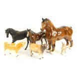 A group of Beswick animals, comprising a large shire horse, 28cm high, small donkey, two cows, a bla