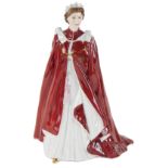 A Royal Worcester celebration of The Queens 80th birthday figure, 23cm high.