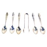 A cased partial set of teaspoons and sugar tongs, each with a shield top, Sheffield 1922, one teaspo