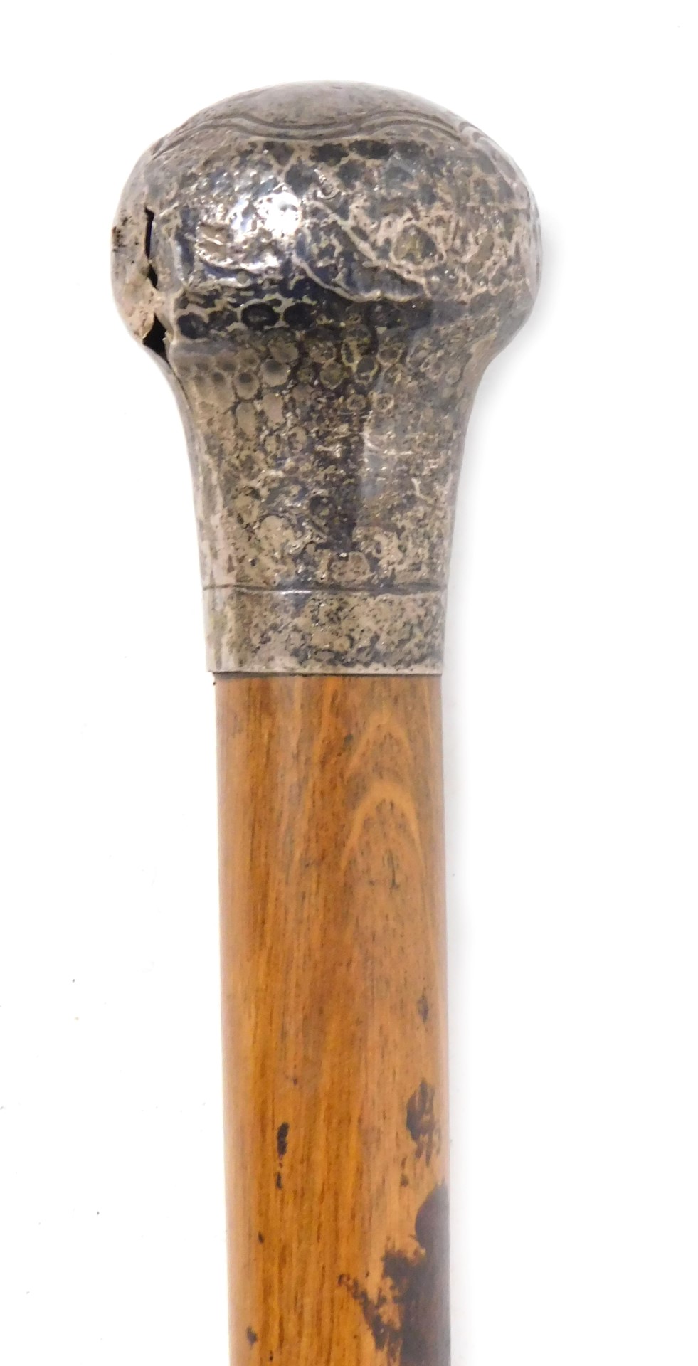 An early 20thC oak walking cane, with silver handle, hallmarks indistinct, 91cm high.