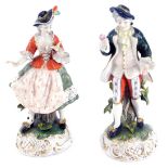 A pair of Dresden Art porcelain figures, comprising lady and gentleman in Regency dress, 24cm high.