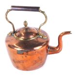 A Victorian copper and brass kettle, 27cm high.