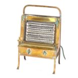 A brass Belling electric fire, with acorn finials and out splayed legs, 59cm high, 36cm wide and 20c