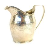 A Victorian silver milk jug, of Georgian helmet form, with engraved floral swag decoration, Walter &