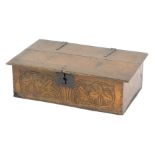 A late 17thC/early 18thC oak bible box, with fan and floral carving, with an iron lock plate, 20cm h