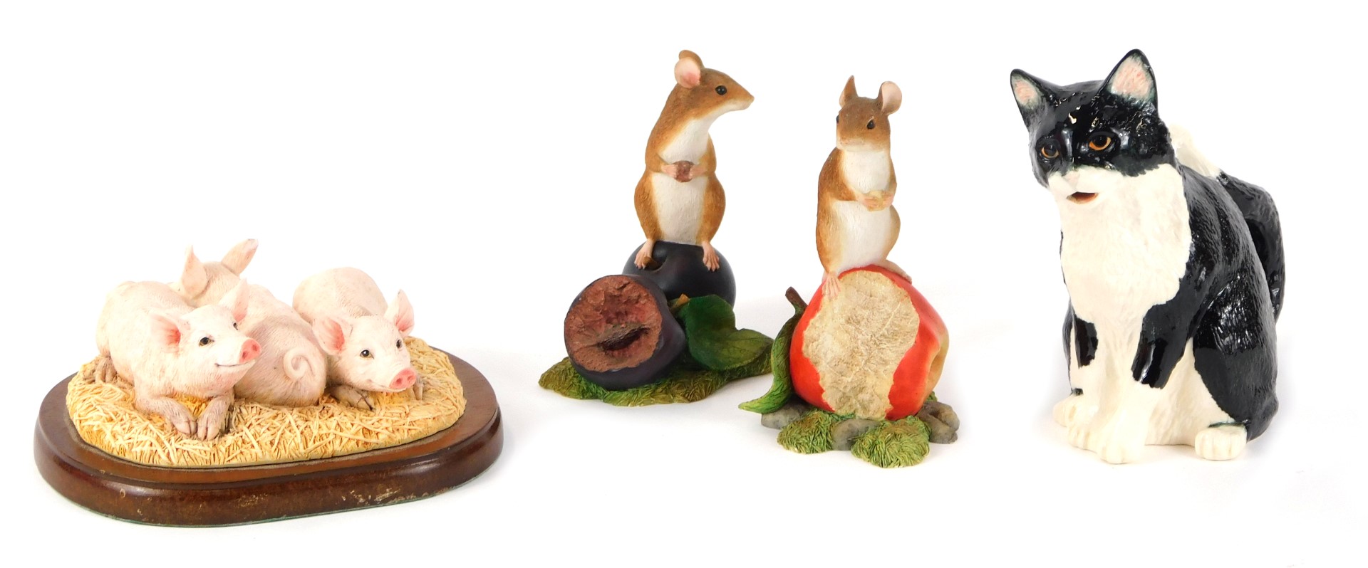 A Border Fine Arts Studio mouse on a plum A8008, 10cm high, a Border Fine Arts Studio mouse on an ap