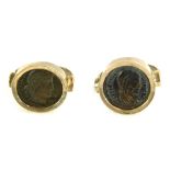Two intaglio dress rings, each depicting warriors, on white metal bands stamped 925, size P½ and Q,