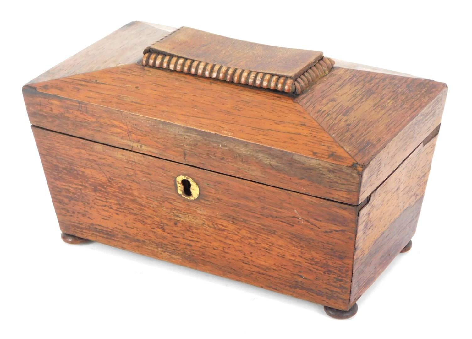 A Regency rosewood tea caddy, of sarcophagus form, twin canisters, on bun feet, 11cm high, 22cm wide