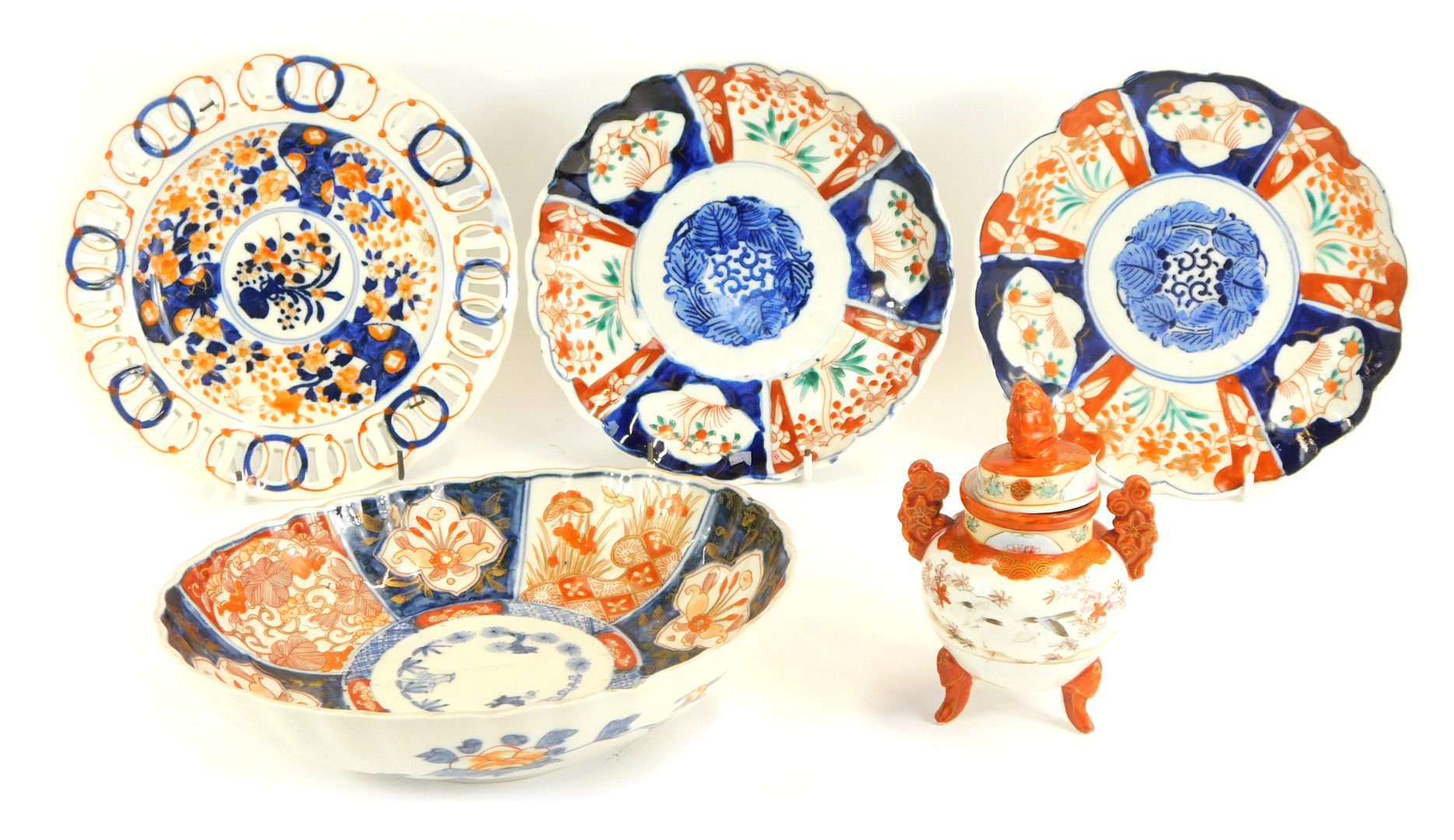 A group of Oriental ceramics, comprising two imari dishes, 21cm diameter, a pierced basket imari cab