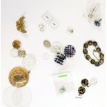 A group of jewellery and effects, comprising Eastern bracelet, watch face slides, pendant brooches e