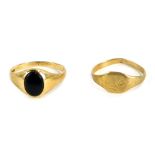 Two 9ct gold signet rings, comprising one set with black onyx, size K½, and another with engraved re