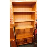 A teak bookcase.