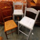 Two blue painted John Lewis pine high chairs, and a cane seated chair. (AF) (3)