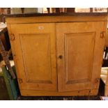 A painted pine kitchen cabinet, with two drawers, painted in cream.