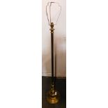 A brass standard lamp.