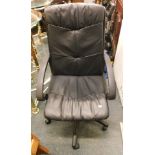 A black leatherette office chair.