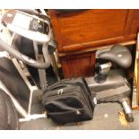 A Horizon fitness exercise bike, and a trolley. (2)