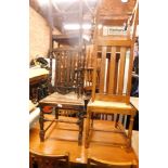 Four oak dining chairs, of various design.