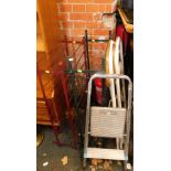 Two metal wine racks, step ladder and two stools. (5)