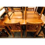 A pine rectangular kitchen table and four chairs. (5)