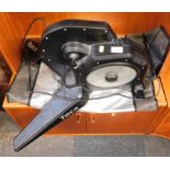 A Tacx exercise bike trainer, with assembly instructions, power cable, mat, etc.