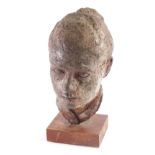 An unusual metal bust of a gentleman, on wooden base, unmarked, 31cm high.