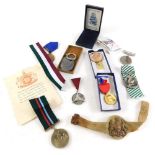 Various medals and medallions, etc., German type medal, 4cm high, Arabic script, Russian medals othe