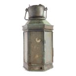 A 20thC ships lantern, with front opening, and swing handle, the main body 47cm high.