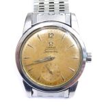 An Omega Seamaster gentleman's wristwatch, with a brown/yellow coloured dial and seconds dial, on a