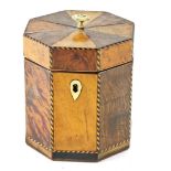 A late 19thC maple and amboyna tea caddy, of octagonal form, with chequer strung borders enclosing a