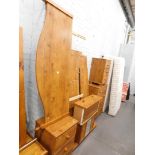 A suite of distressed pine effect bedroom furniture comprising of two bedside chest of drawers, ward