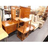 A teak dressing table, an pine dressing mirror, nest of three oak tables, small yew chest of drawers