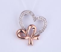 + VAT Ladies 9ct White Gold Heart Shape Pendant With Rose Gold Bow