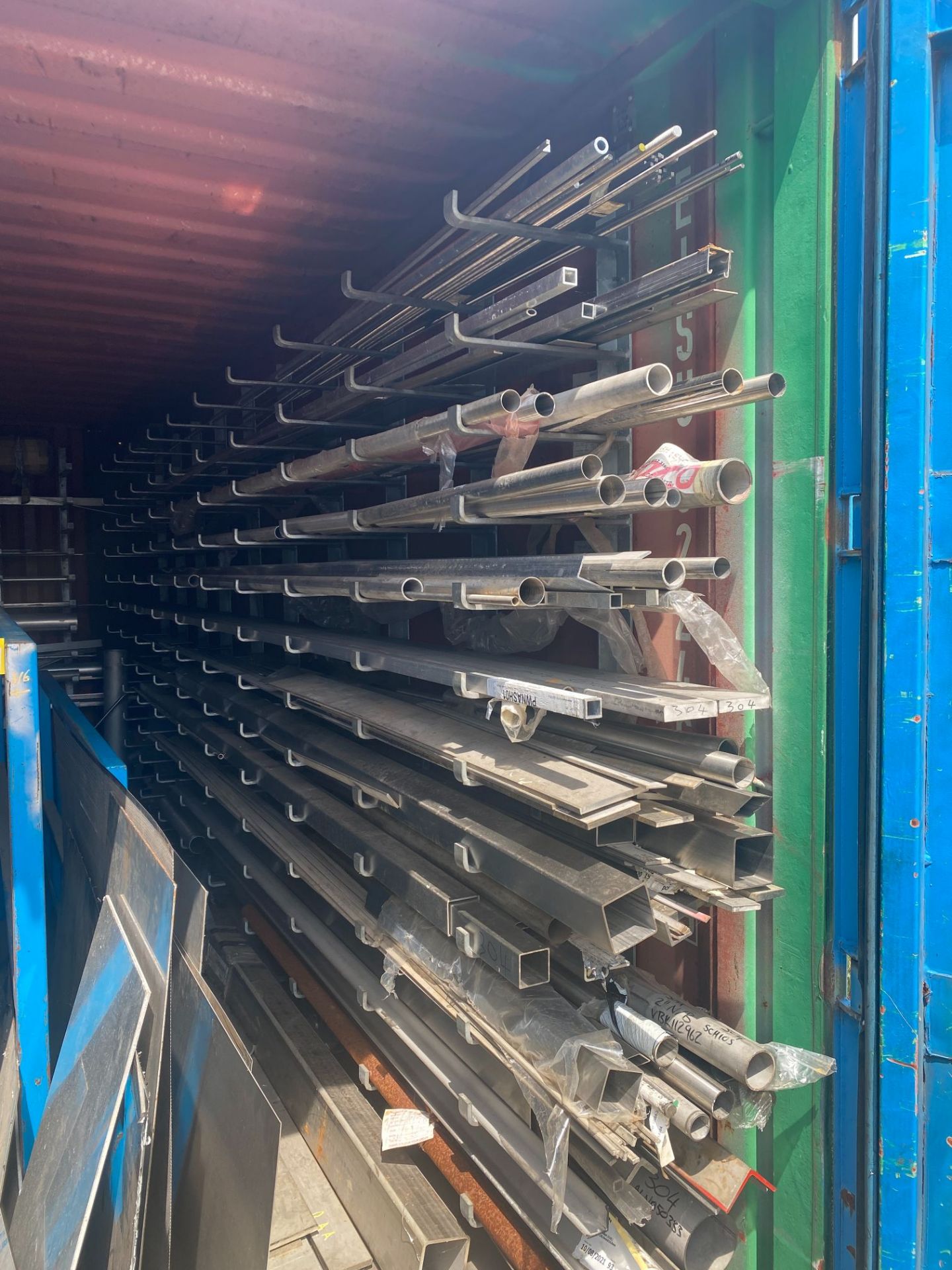20' steel shipping container and contents including tube, flat, angle & sheet, various (approx 90 - Image 14 of 14